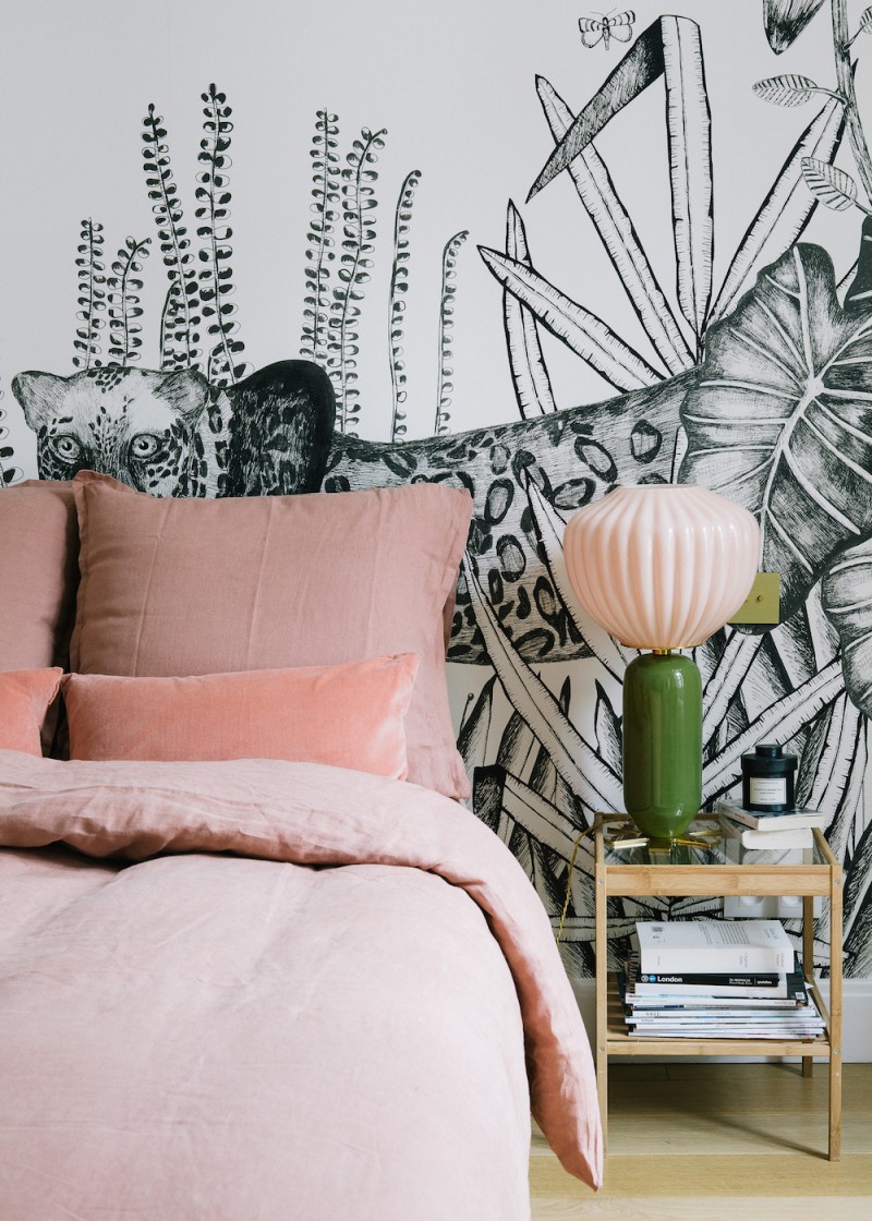 Morgane Sézalory, Paris apartment. Bedding Sézane. Palm wallpaper Bien Fait. Pink lamp India Mahdavi.